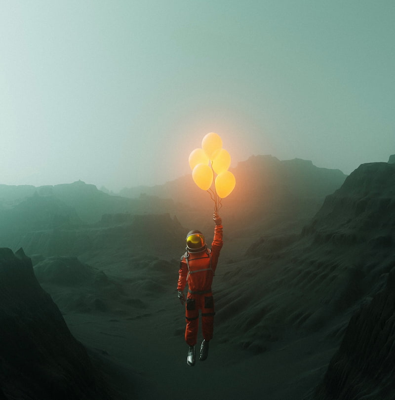 Image of an astronaut flying into the sky holding golden balloons symbolic of spiritual delusion